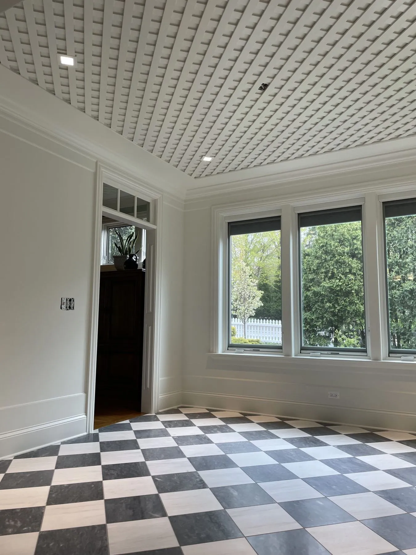 Checkerboard floor and corner windows