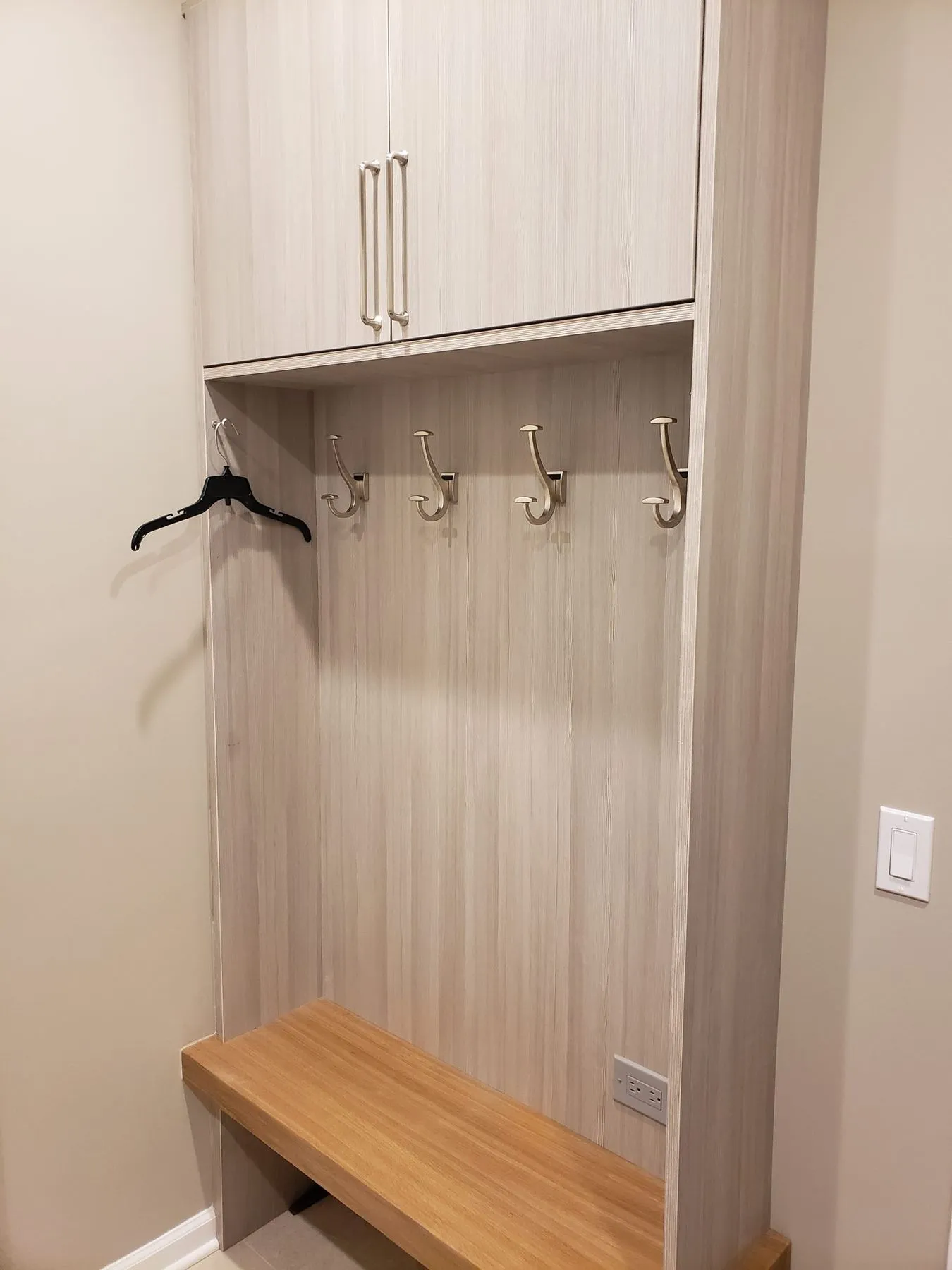 Mudroom locker with an upper cabinet