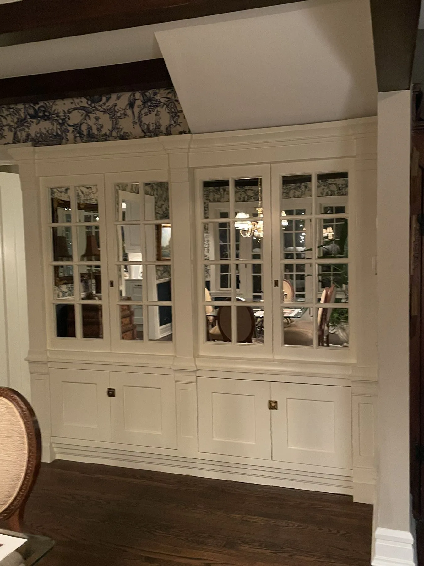 Custom bar cabinet with mirrored glass doors